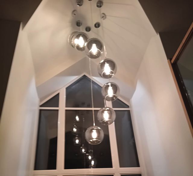 Double height hall pendant lighting