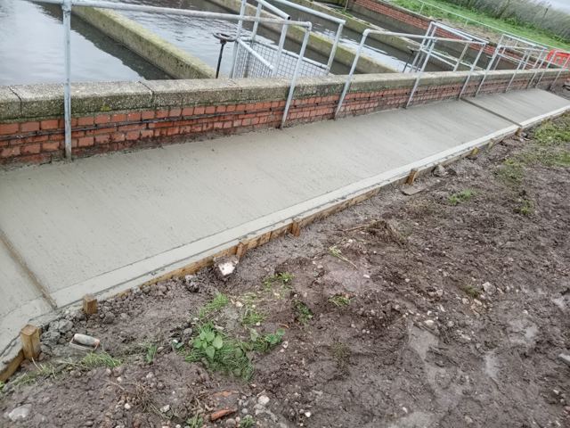 Water treatment concrete footpath
